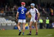 28 November 2021; David Hickey of Raharney shakes hands with Dara Purcell of Kilmacud Crokes after the 2021 AIB Leinster Club Senior Hurling Championship Quarter-Final match between Raharney Hurling Club and Kilmacud Crokes at TEG Cusack Park in Mullingar, Westmeath. Photo by Daire Brennan/Sportsfile