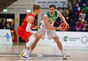 28 November 2021; Kyle Hosford of Ireland in action against Thomas Klepiesz of Austria during the FIBA EuroBasket 2025 Pre-Qualifiers First Round Group A match between Ireland and Austria at National Basketball Arena in Tallaght, Dublin. Photo by Brendan Moran/Sportsfile
