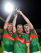 28 November 2021; The McGrath brothers, from left, John, Noel and Brian lift the cup after their side's victory in the Tipperary County Senior Club Hurling Championship Final Replay match between Thurles Sarsfields and Loughmore/Castleiney at Semple Stadium in Thurles, Tipperary. Photo by Harry Murphy/Sportsfile