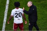 28 November 2021; Bohemians assistant manager Trevor Croly encourages Promise Omochere of Bohemians as he prepares to come on for a second half substitution during the Extra.ie FAI Cup Final match between Bohemians and St Patrick's Athletic at Aviva Stadium in Dublin. Photo by Ben McShane/Sportsfile