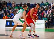 28 November 2021; Bogic Vujosevic of Austria in action against Sean Flood of Ireland during the FIBA EuroBasket 2025 Pre-Qualifiers First Round Group A match between Ireland and Austria at National Basketball Arena in Tallaght, Dublin. Photo by Brendan Moran/Sportsfile