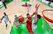 28 November 2021; Jozo Rados of Austria goes for a basket despite the efforts of Jordan Blount of Ireland during the FIBA EuroBasket 2025 Pre-Qualifiers First Round Group A match between Ireland and Austria at National Basketball Arena in Tallaght, Dublin. Photo by Brendan Moran/Sportsfile