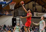 28 November 2021; Marvin Ogunsipe of Austria goes for a basket despite the efforts of John Carroll of Ireland, right, during the FIBA EuroBasket 2025 Pre-Qualifiers First Round Group A match between Ireland and Austria at National Basketball Arena in Tallaght, Dublin. Photo by Brendan Moran/Sportsfile