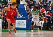 28 November 2021; Taiwo Badmus of Ireland in action against Jakob Lohr of Austria during the FIBA EuroBasket 2025 Pre-Qualifiers First Round Group A match between Ireland and Austria at National Basketball Arena in Tallaght, Dublin. Photo by Brendan Moran/Sportsfile