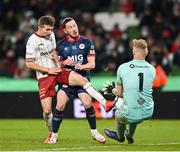 28 November 2021; Ronan Coughlan of St Patrick's Athletic in action against Tyreke Wilson, left, and Bohemians goalkeeper James Talbot during the Extra.ie FAI Cup Final match between Bohemians and St Patrick's Athletic at Aviva Stadium in Dublin. Photo by Seb Daly/Sportsfile