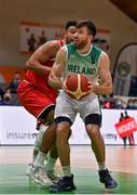 28 November 2021; Brian Fitzpatrick of Ireland in action against Marvin Ogunsipe of Austria during the FIBA EuroBasket 2025 Pre-Qualifiers First Round Group A match between Ireland and Austria at National Basketball Arena in Tallaght, Dublin. Photo by Brendan Moran/Sportsfile
