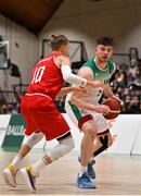 28 November 2021; Jordan Blount of Ireland in action against Thomas Klepiesz of Austria during the FIBA EuroBasket 2025 Pre-Qualifiers First Round Group A match between Ireland and Austria at National Basketball Arena in Tallaght, Dublin. Photo by Brendan Moran/Sportsfile