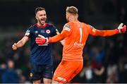 28 November 2021; Robbie Benson of St Patrick's Athletic celebrates with goalkeeper Vitezslav Jaros after scoring the winning penalty during the Extra.ie FAI Cup Final match between Bohemians and St Patrick's Athletic at Aviva Stadium in Dublin. Photo by Eóin Noonan/Sportsfile