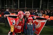 28 November 2021; Darragh Burns of St Patrick's Athletic celebrates with cousins Bobbi, left, and Tony after his side's victory in the Extra.ie FAI Cup Final match between Bohemians and St Patrick's Athletic at Aviva Stadium in Dublin. Photo by Michael P Ryan/Sportsfile