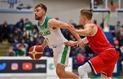 28 November 2021; Sean Flood of Ireland in action against Thomas Klepiesz of Austria during the FIBA EuroBasket 2025 Pre-Qualifiers First Round Group A match between Ireland and Austria at National Basketball Arena in Tallaght, Dublin. Photo by Brendan Moran/Sportsfile