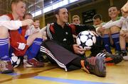 29 March 2004; Manchester United and Republic of Ireland defender John O'Shea speaks to prize winners at the Official launch of the &quot;This Is Football 2004&quot; game on Playstation 2. Alsaa Sports Centre, Dublin.  Picture credit; David Maher / SPORTSFILE *EDI*
