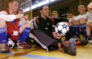 29 March 2004; Manchester United and Republic of Ireland defender John O'Shea speaks to prize winners at the Official launch of the &quot;This Is Football 2004&quot; game on Playstation 2. Alsaa Sports Centre, Dublin.  Picture credit; David Maher / SPORTSFILE *EDI*