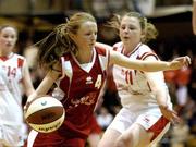 30 March 2004; Brigid MacDonell, Dunmore, in action against Siobhan Hurley, St Mary's Edenderry. All - Ireland Schoolgirls Basketball League, Cadette 'C' Final, St. Mary's Edenderry, Co. Offaly, v Dunmore Community School, Co. Galway, ESB Arena, Tallaght, Dublin. Picture credit; Brendan Moran / SPORTSFILE *EDI*