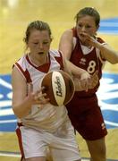 30 March 2004; Maura Byrne, St. Mary's Edenderry, in action against Cassandra Knight, Dunmore. All - Ireland Schoolgirls Basketball League, Cadette 'C' Final, St. Mary's Edenderry, Co. Offaly, v Dunmore Community School, Co. Galway, ESB Arena, Tallaght, Dublin. Picture credit; Brendan Moran / SPORTSFILE *EDI*