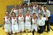 30 March 2004; The team from St. Mary's Edenderry, celebrate with the cup after the game. All - Ireland Schoolgirls Basketball League, Cadette 'C' Final, St. Mary's Edenderry, Co. Offaly, v Dunmore Community School, Co. Galway, ESB Arena, Tallaght, Dublin. Picture credit; Brendan Moran / SPORTSFILE *EDI*