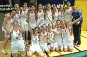 30 March 2004; The team from Salesians, Limerick celebrate with the cup after the game. All - Ireland Schoolgirls Basketball League, Senior 'C' Final, Salesians, Limerick, v Killarney Community College, Kerry, ESB Arena, Tallaght, Dublin. Picture credit; Brendan Moran / SPORTSFILE *EDI*