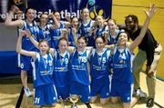 31 March 2004; The team from Holy Faith Clontarf celebrate with the cup after the game. All - Ireland Schoolgirls Basketball League, Cadette 'A' Final, Presentation Thurles, Co. Tipperary v Holy Faith Clontarf, Co. Dublin, ESB Arena, Tallaght, Dublin. Picture credit; Brendan Moran / SPORTSFILE *EDI*