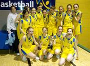 31 March 2004; The team from Castletroy College celebrate with the cup after the game. All - Ireland Schoolgirls Basketball League, Cadette 'B' Final, Castletroy College, Limerick, v Colaiste Mhuire, Crosshaven, Co. Cork, ESB Arena, Tallaght, Dublin. Picture credit; Brendan Moran / SPORTSFILE *EDI*