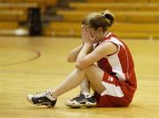 31 March 2004; A dejected Fiona Scannell, Colaiste Mhuire, after her side were defeated by Castletroy College. All - Ireland Schoolgirls Basketball League, Cadette 'B' Final, Castletroy College, Limerick, v Colaiste Mhuire, Crosshaven, Co. Cork, ESB Arena, Tallaght, Dublin. Picture credit; Brendan Moran / SPORTSFILE *EDI*