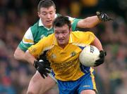 21 March 2004; Brian Higgins, Roscommon, in action against Ciaran McManus, Offaly. Allianz Football League 2004, Division 2A, Round 6, Offaly v Roscommon, O'Connor Park, Tullamore, Co. Offaly. Picture credit; David Maher / SPORTSFILE *EDI*