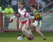 4 April 2004; Gerard Cavlan, Tyrone, in action against John Sheehan, Kerry. Allianz Football League, Division 1A, Round 7, Tyrone v Kerry, Healy Park, Omagh, Co. Tyrone. Picture credit; Brendan Moran / SPORTSFILE *EDI*
