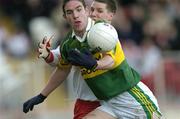 4 April 2004; Declan O'Sullivan, Kerry, in action against Colin Holmes, Tyrone. Allianz Football League, Division 1A, Round 7, Tyrone v Kerry, Healy Park, Omagh, Co. Tyrone. Picture credit; Brendan Moran / SPORTSFILE *EDI*