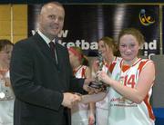 30 March 2004; Brona Sullivan, St. Mary's Edenderry, receives the MVP from Martin Hehir, Schools Development Officer of Basketball Ireland. All - Ireland Schoolgirls Basketball League, Cadette 'C' Final, St. Mary's Edenderry, Co. Offaly, v Dunmore C.C., C. Galway, ESB Arena, Tallaght, Dublin. Picture credit; Brendan Moran / SPORTSFILE *EDI*
