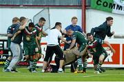 26 July 2013; Cork City's Ciaran Kilduff, far right, celebrates after scoring his side's first goal with team-mates and supporters. Airtricity League Premier Division, St. Patrick’s Athletic v Cork City, Richmond Park, Dublin. Picture credit: David Maher / SPORTSFILE