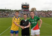 21 July 2013; Referee Ray McBrien with Roscommon captain Ronan Daly and Mayo captain Stephen Coen. Electric Ireland Connacht GAA Football Minor Championship Final, Roscommon v Mayo, Elverys MacHale Park, Castlebar, Co. Mayo. Picture credit: Stephen McCarthy / SPORTSFILE