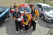 27 July 2013; Kildare footballer John Doyle and former Kilkenny hurler Martin Comerford supporting the Opel Kit for Clubs Blitz Day in St. Brigids GAA Club, Blanchardstown, with Gary Lynch, Avril Geaney and Ed Brady, from Gowan Motors. For every test drive, car service or Opel purchase made through the Opel dealer network, your local GAA club is awarded points. Build up your points and redeem them against high quality kit for your club! Log onto opelkitforclubs.com http://opelkitforclubs.com and start earning points today.  Support your local GAA club! St. Brigid's GAA Club, Blanchardstown, Dublin. Picture credit: Barry Cregg / SPORTSFILE