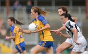 27 July 2013; Eimear Considine, Clare, in action against Louise Keatley and Paula Leatley, right, Kildare. TG4 All-Ireland Ladies Senior Football Championship, Round 1, Qualifier, Clare v Kildare, Pairc Sean Mac Diarmada, Carrick-on-Shannon, Co. Leitrim. Picture credit: Oliver McVeigh / SPORTSFILE