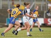 27 July 2013; Brianne Leahy, Kildare, in action against Niamh Keane, Clare. TG4 All-Ireland Ladies Senior Football Championship, Round 1, Qualifier, Clare v Kildare, Pairc Sean Mac Diarmada, Carrick-on-Shannon, Co. Leitrim. Picture credit: Oliver McVeigh / SPORTSFILE