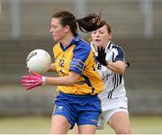 27 July 2013; Maria Kelly, Clare, in action against Aisling Lambe, Kildare. TG4 All-Ireland Ladies Senior Football Championship, Round 1, Qualifier, Clare v Kildare, Pairc Sean Mac Diarmada, Carrick-on-Shannon, Co. Leitrim. Picture credit: Oliver McVeigh / SPORTSFILE