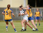 27 July 2013; Louise Keatley, Kildare, in action against Fiona Lafferty, Clare. TG4 All-Ireland Ladies Senior Football Championship, Round 1, Qualifier, Clare v Kildare, Pairc Sean Mac Diarmada, Carrick-on-Shannon, Co. Leitrim. Picture credit: Oliver McVeigh / SPORTSFILE