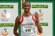 27 July 2013; Steven Colvert, Crusaders A.C., Co. Dublin, celebrates with his gold medal in the Men's 200m at the Woodie’s DIY National Senior Track and Field Championships. Morton Stadium, Santry, Co. Dublin. Picture credit: Matt Browne / SPORTSFILE