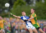 27 July 2013; David Walsh, Donegal, in action against Colm Begley, Laois. GAA Football All-Ireland Senior Championship, Round 4, Donegal v Laois, Pairc Sean Mac Diarmada, Carrick-on-Shannon, Co. Leitrim. Picture credit: Oliver McVeigh / SPORTSFILE