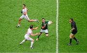 27 July 2013; Meath's Graham Reilly dodges between referee Maurice Deegan and Tyrone players Mark Donnelly, left, and Martin Penrose. GAA Football All-Ireland Senior Championship, Round 4, Meath v Tyrone, Croke Park, Dublin. Picture credit: Ray McManus / SPORTSFILE