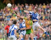 27 July 2013; Michael Murphy, Donegal, in action against Kieran Willis and Mark Timmons, Laois. GAA Football All-Ireland Senior Championship, Round 4, Donegal v Laois, Pairc Sean Mac Diarmada, Carrick-on-Shannon, Co. Leitrim. Picture credit: Oliver McVeigh / SPORTSFILE