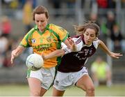 27 July 2013; Orlagh Carr, Donegal, in action against Karen Hegarty, Westmeath. TG4 All-Ireland Ladies Senior Football Championship, Round 1, Qualifier, Donegal v Westmeath, Pairc Sean Mac Diarmada, Carrick-on-Shannon, Co. Leitrim. Picture credit: Oliver McVeigh / SPORTSFILE