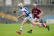 28 July 2013; Ciaran McEvoy, Laois, in action against Adrian Morrissey, Galway. Electric Ireland GAA Hurling All-Ireland Minor Championship, Quarter-Final, Galway v Laois, Semple Stadium, Thurles, Co. Tipperary. Picture credit: Ray McManus / SPORTSFILE