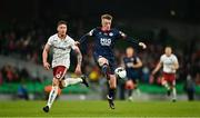 28 November 2021; Chris Forrester of St Patrick's Athletic in action against Rob Cornwall of Bohemians during the Extra.ie FAI Cup Final match between Bohemians and St Patrick's Athletic at Aviva Stadium in Dublin. Photo by Eóin Noonan/Sportsfile