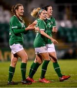 30 November 2021; Denise O'Sullivan of Republic of Ireland celebrates after scoring her side's fourth goal with team-mates Niamh Fahey, right, and Kyra Carusa, left, during the FIFA Women's World Cup 2023 qualifying group A match between Republic of Ireland and Georgia at Tallaght Stadium in Dublin. Photo by Stephen McCarthy/Sportsfile