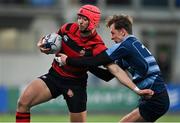 1 December 2021; Ashton Botha of Kilkenny College is tackled by Callum Oliphant of Castleknock College  during the Bank of Ireland Leinster Rugby Schools Senior League Division 1A Semi-Final match between Castleknock College and Kilkenny College at Energia Park in Dublin. Photo by Brendan Moran/Sportsfile