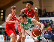 28 November 2021; Lorcan Murphy of Ireland in action against Marvin Ogunsipe of Austria during the FIBA EuroBasket 2025 Pre-Qualifiers First Round Group A match between Ireland and Austria at National Basketball Arena in Tallaght, Dublin. Photo by Brendan Moran/Sportsfile