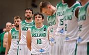 28 November 2021; Ciaran Roe of Ireland stands with his team-mates during Amhrán na bhFiann before the FIBA EuroBasket 2025 Pre-Qualifiers First Round Group A match between Ireland and Austria at National Basketball Arena in Tallaght, Dublin. Photo by Brendan Moran/Sportsfile