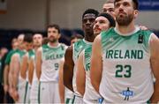 28 November 2021; Taiwo Badmus of Ireland stands with his team-mates during Amhrán na bhFiann before the FIBA EuroBasket 2025 Pre-Qualifiers First Round Group A match between Ireland and Austria at National Basketball Arena in Tallaght, Dublin. Photo by Brendan Moran/Sportsfile