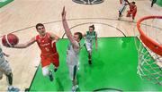 28 November 2021; Bogic Vujosevic of Austria goes up for a basket against John Carroll of Ireland during the FIBA EuroBasket 2025 Pre-Qualifiers First Round Group A match between Ireland and Austria at National Basketball Arena in Tallaght, Dublin. Photo by Brendan Moran/Sportsfile