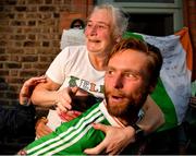 8 August 2021; Kellie Harrington's mother Yvonne and her brother Chirstopher celebrate outside their home at Portland Row in Dublin, after her Tokyo 2020 Olympics lightweight final bout against Beatriz Ferreira of Brazil.  Photo by Ray McManus/Sportsfile
