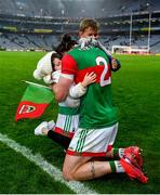14 August 2021; Pádraig O'Hora of Mayo celebrates with his children Caiden and Mila-Rae after his side's victory over Dublin in their GAA Football All-Ireland Senior Championship semi-final match at Croke Park in Dublin. Photo by Seb Daly/Sportsfile