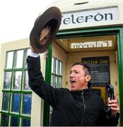 30 September 2021; Jockey Frankie Dettori, with the hat of the late trainer Barney Curley in the famous phone box, associated with the Yellow Sam coup in 1975, before the Gannon City Recovery and Recycling Services Ltd supporting DAFA handicap at Bellewstown Racecourse in Collierstown, Meath. Photo by Matt Browne/Sportsfile